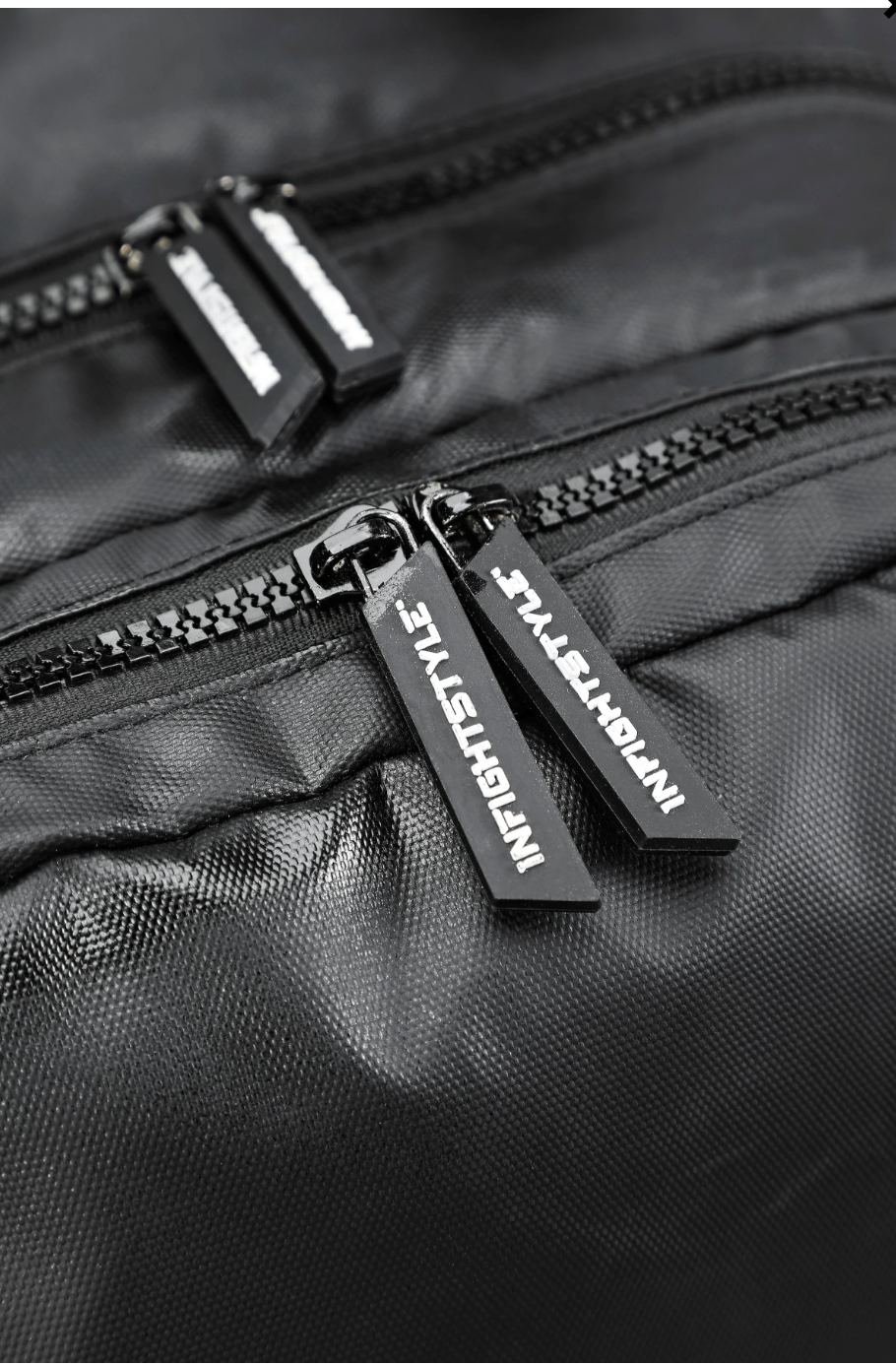 Zipper detail of the Ultimate Urban Trainer Backpack by InfightStyle, designed for athletes and Muay Thai enthusiasts.