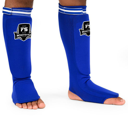 InFightStyle Soft Shin Guards for Muay Thai in blue, perfect fit for secure protection during workouts and easy to clean.