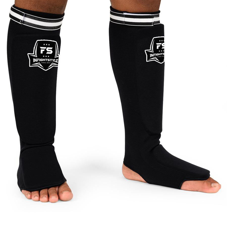 InFightStyle Soft Shin Guards for Muay Thai in black, designed for youth, secure fit with easy machine wash.