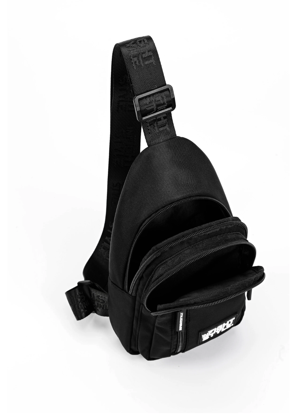 Limited Edition Urban Sling Bag in black with multiple zip pockets and adjustable strap.